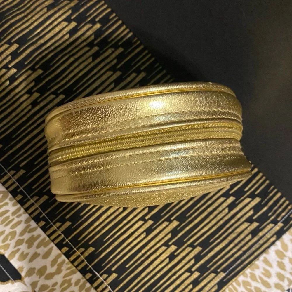 DIOR GOLD ZIPPER POUCH